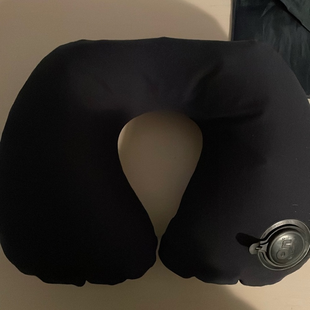 Inflatable travel neck pillow w/ carry case by Lewis N Clark. Great for airplane
